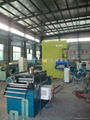 Floor panel forming machine 