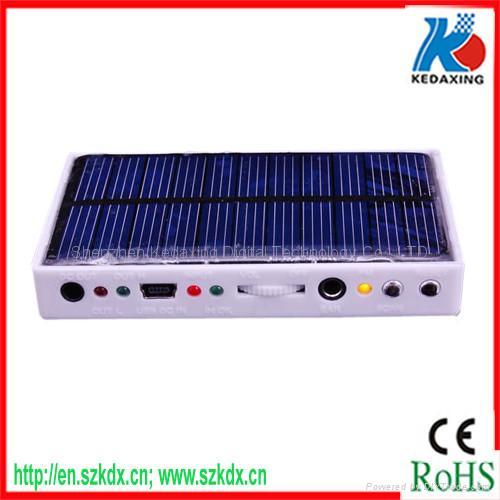 Solar mobile phone charger with radio and UV money-detector function