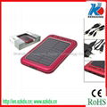 Solar charger with LED flashlight