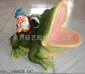 Polyresin garden gnome with frog ornament