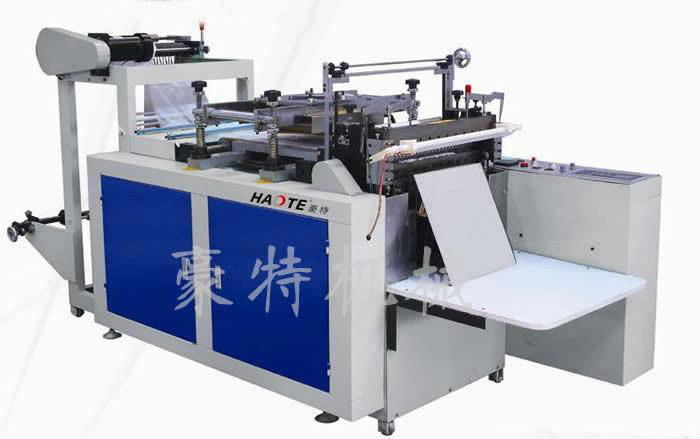 Disposable glove making machine