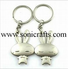 Sell Lovely rabbit design metal lovers keychain promotional gifts