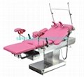 Electric obstetric delivery bed with auxiliary table