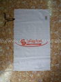 Bag for packaging goods with tie strings 1