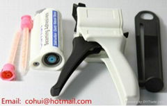 The dispensing gun for adhesive