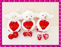 stuffed sheep with red heart