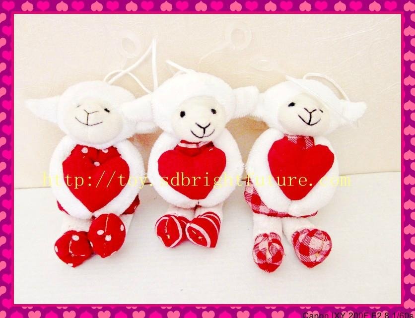 stuffed sheep with red heart