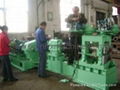 Four high reversing rolling mill