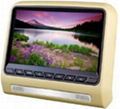 Detchable automobile headrest dvd player