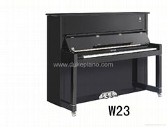 black baby upright piano W23