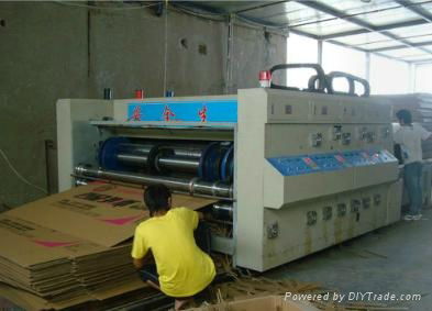 High speed flexo printing and slotting machine
