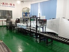 Full Automatic Weighing Filling + Lids Dropping + Capping Line
