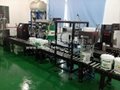Full Automatic Weighing Filling + Lids Dropping + Capping Line 3
