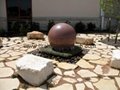 stone sphere fountain installed in Texas
