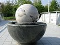 floating sphere, rolling balls, black granite ball