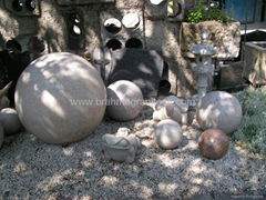 Rainbow sandstone sphere and Granite trio