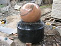 Rainbow sandstone sphere and Granite trio