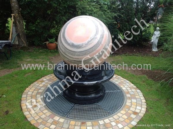 Floating marble stone sphere fountains