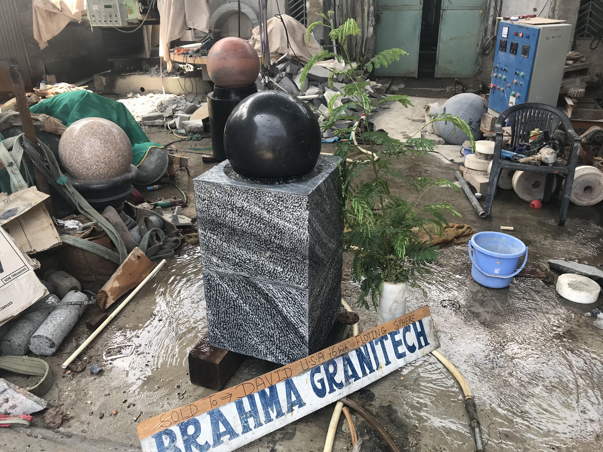 black granite globe monument