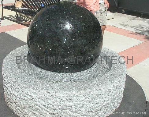 water globe,spinning globe,granite spheres,garden water feature
