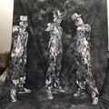 disco ball suit silver mirror man