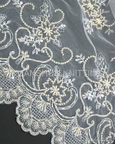 embroidered with handwork on mesh 3