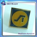 Gold metal pin badge with enamel
