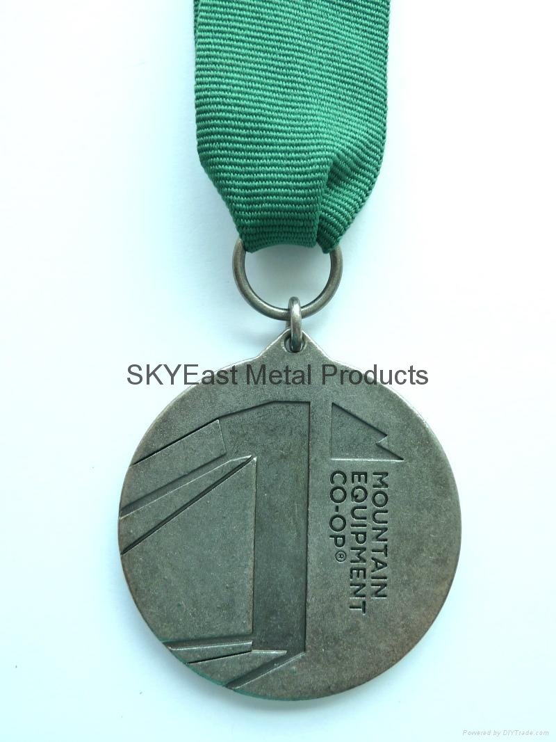 Raised Logo Metal Medallions with Webbing 3