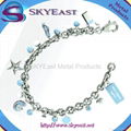 Metal Bracelet With Shiny Charms and Logo 1