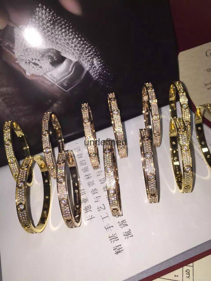 Cartier bracelet with gold /platinum plating with studded diamond crystal 
