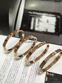 Cartier bracelet with gold /platinum plating with studded diamond crystal  15