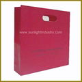 die cut handle paper shopping bag