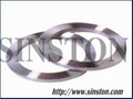 Corrugated metal gasket with outer ring