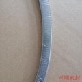 Kammprofile gasket with corrugated graphite tape coated both sides