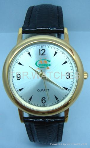 stainless steel watch with genuine leather strap