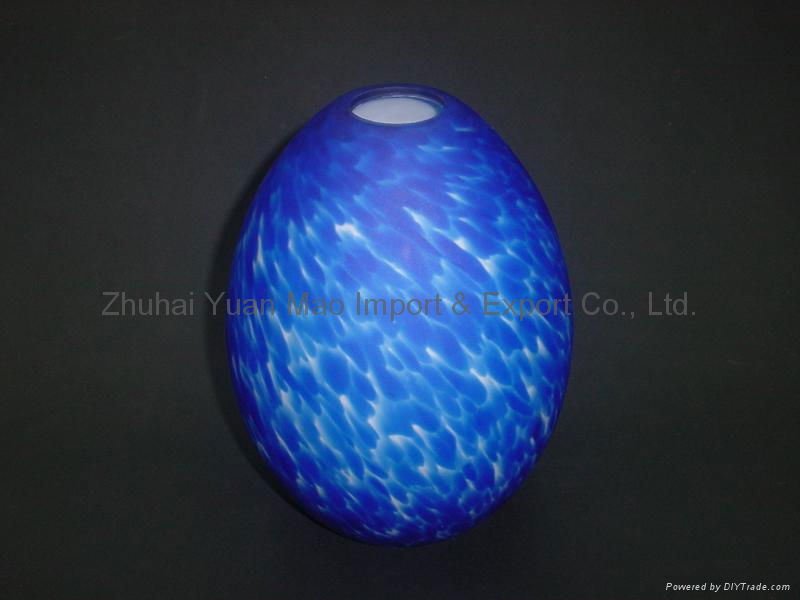 Handblown glass lamp shade in spotted blue color