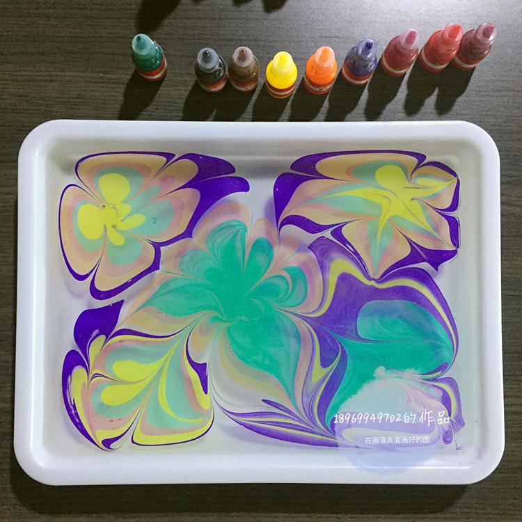 使颜料摇匀后再开始使用) 3,用画针在水中轻轻划过,会形成各种唯美的