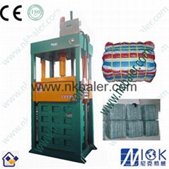 clothes baling machine