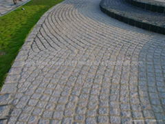 Cube paving stone for landscaping.