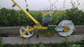 Manual onion seeder