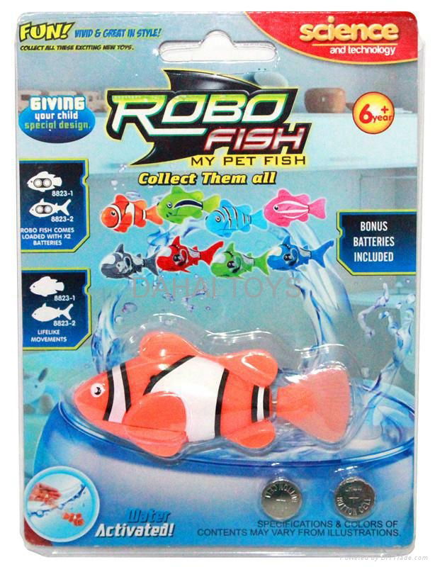 lovely robo fish swimming in the water with battery and shark