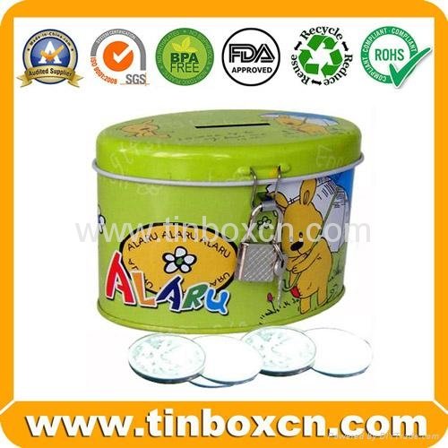 Oval tin coink bank with lock and key