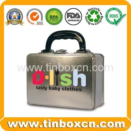 Tin metal lunch box with hard plastic handle and clasp
