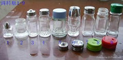 Seasoning bottles, salt and pepper