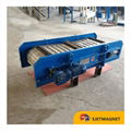 hanging magnetic separator above conveyor for iron attraction 