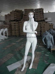 shop display female mannequin with sculpture hair head