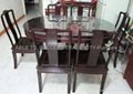 Rosewood dinning table with 6 chairs, plain design.