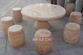 Yellow sandstone tables and chairs with wood grain 