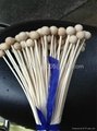 Rattan stick with wooden bead