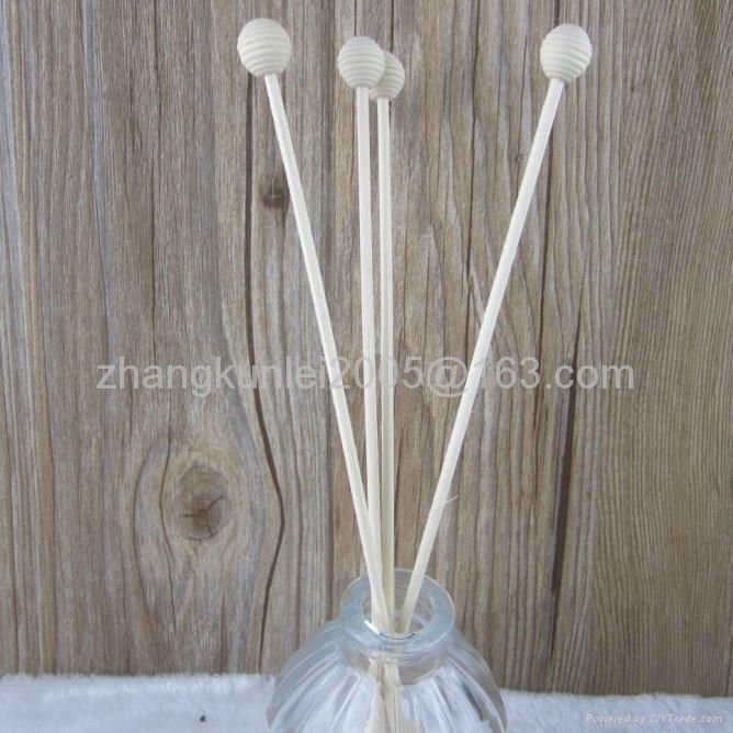 Rattan stick with wooden bead 5